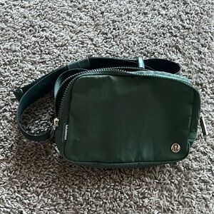 Dark green lululemon belt bag